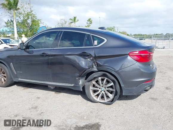 2015 BMW X6 xDrive35i z VIN 5UXKU2C59F0N76242, wystawiony jako IAAI lot #41714644 z przebiegiem 170 851 mil mil oraz . Historia ofert i sprzedaży dostępna na DreamBid. Obrazek 6.