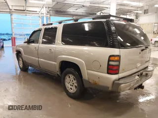 2004 Chevrolet Suburban Z71 with VIN 3GNFK16T24G213519, listed as a IAAI auction lot 41552418 with 244,017 mi miles. Bid and sale history available at carsss.com. Image 3.