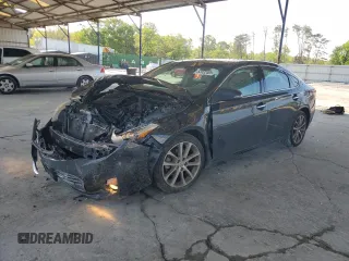 2015 Toyota Avalon Limited with VIN 4T1BK1EB8FU149076, listed as a Copart auction lot 53856665 with 137,179 mi miles and Salvage Title. Bid and sale history available at DreamBid. Image 1.