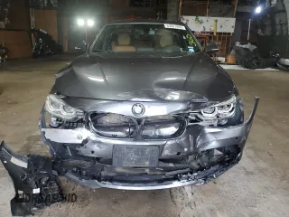 2016 BMW 3 Series 328i xDrive with VIN WBA8E3C59GK502613, listed as a Copart auction lot 63661805 with 127,559 mi miles and Salvage title. Bid and sale history available at DreamBid. Image 5.