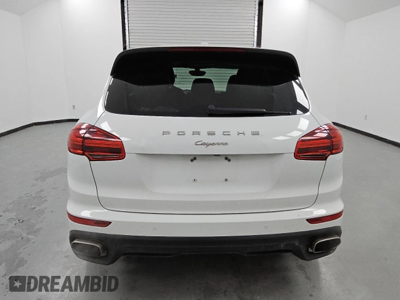 2016 Porsche Cayenne with VIN WP1AA2A28GLA01613, listed as a Copart auction lot 46182805 with 121,911 mi miles and Clean Title. Bid and sale history available at carsss.com. Image 6.
