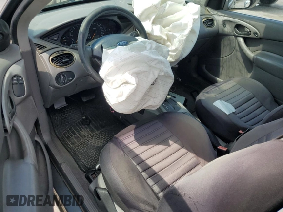 2004 Ford Focus ZX3 with VIN 3FAFP31Z64R123057, listed as a Copart auction lot 50514905 with 187,941 mi miles and Salvage title. Bid and sale history available at DreamBid. Image 8.