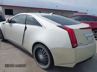 2011 Cadillac CTS Performance with VIN 1G6DJ1ED3B0142767, listed as a IAAI auction lot 41676404 with 238,027 mi miles and . Bid and sale history available at DreamBid. Image 3.