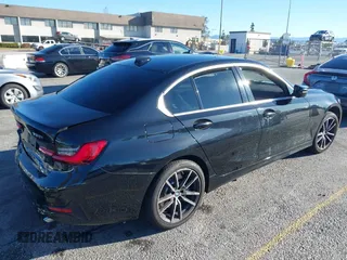 2021 BMW 3 Series 330i with VIN 3MW5R1J08M8B51760, listed as a IAAI auction lot 41605331 with 29,455 mi miles. Bid and sale history available at carsss.com. Image 4.