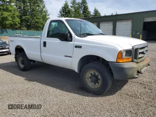 1999 Ford F-250 XL with VIN 1FTNF21F3XEC38845, listed as a Copart auction lot 60869825 with 327,518 mi miles and Clean title. Bid and sale history available at DreamBid. Image 4.