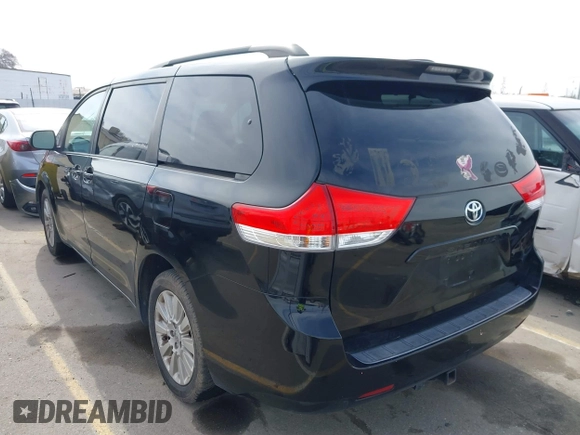 2012 Toyota Sienna LE with VIN 5TDJK3DC0CS037989, listed as a IAAI auction lot 41622546 with 165,363 mi miles. Bid and sale history available at carsss.com. Image 3.