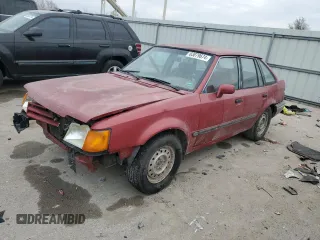 1989 Ford Escort z VIN 1FAPP959XKW361294, wystawiony jako Copart lot #83879674 z przebiegiem 12 406 mil mil oraz Szkody całkowita. Historia ofert i sprzedaży dostępna na DreamBid. Obrazek 1.