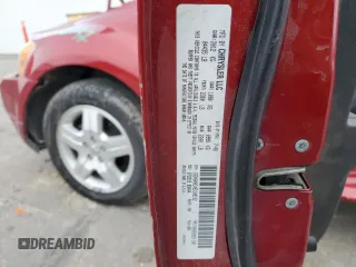 2009 Dodge Caliber SXT with VIN 1B3HB48CX9D108152, listed as a Copart auction lot 81012064 with 189,650 mi miles and Salvage Title. Bid and sale history available at DreamBid. Image 12.