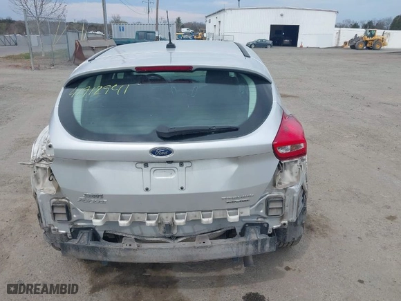 2015 Ford Focus Titanium with VIN 1FADP3N27FL228549, listed as a IAAI auction lot 41912941 with 69,025 mi miles. Bid and sale history available at carsss.com. Image 16.