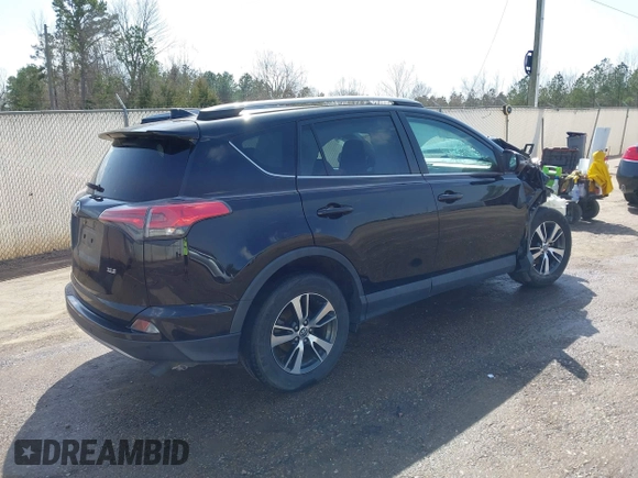 2018 Toyota RAV4 XLE with VIN 2T3WFREVXJW444002, listed as a IAAI auction lot 41795600 with 115,120 mi miles. Bid and sale history available at carsss.com. Image 4.