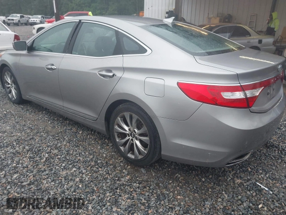 2013 Hyundai Azera z VIN KMHFG4JG7DA199553, wystawiony jako IAAI lot #42218944 z przebiegiem 131 959 mil mil oraz . Historia ofert i sprzedaży dostępna na DreamBid. Obrazek 3.