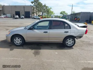 2001 Honda Civic LX with VIN 2HGES16511H554168, listed as a IAAI auction lot 42009621 with 163,801 mi miles. Bid and sale history available at carsss.com. Image 15.