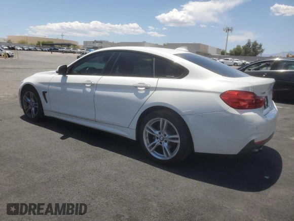 2015 BMW 4 Series 428i xDrive with VIN WBA4C9C50FG135058, listed as a Copart auction lot 60287555 with 86,809 mi miles and Salvage title. Bid and sale history available at DreamBid. Image 2.