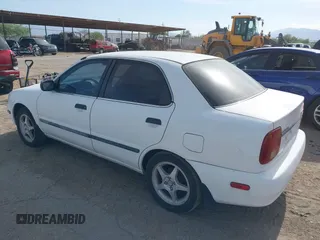 2001 Suzuki Esteem GL z VIN JS2GB41S515210894, wystawiony jako IAAI lot #42234772 z przebiegiem 180 182 mil mil oraz . Historia ofert i sprzedaży dostępna na DreamBid. Obrazek 3.