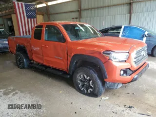 2017 Toyota Tacoma SR5 with VIN 5TFSZ5AN5HX063619, listed as a Copart auction lot 61084235 with 112,980 mi miles and Salvage title. Bid and sale history available at DreamBid. Image 4.