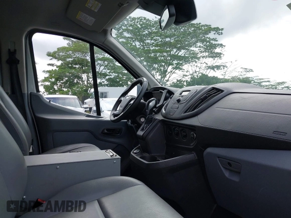 2018 Ford Transit z VIN 1FTYR1YM9JKB43850, wystawiony jako IAAI lot #42151963 z przebiegiem 72 286 mil mil oraz . Historia ofert i sprzedaży dostępna na DreamBid. Obrazek 5.
