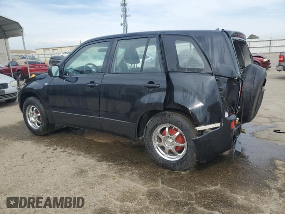 2007 Suzuki Grand Vitara with VIN JS3TE941474202110, listed as a Copart auction lot 52110865 with 132,661 mi miles and Salvage title. Bid and sale history available at DreamBid. Image 2.