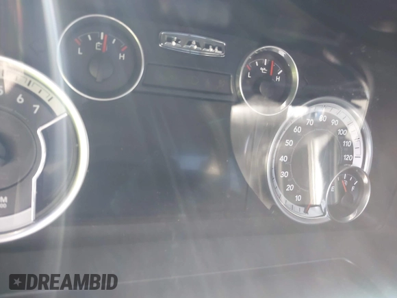 2014 Ram 1500 Sport z VIN 1C6RR6MT3ES366719, wystawiony jako IAAI lot #42228139 z przebiegiem Nie podano mil oraz . Historia ofert i sprzedaży dostępna na DreamBid. Obrazek 7.
