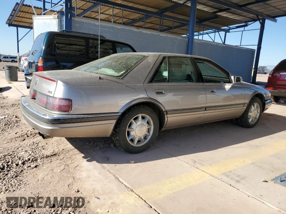 1997 Cadillac Seville Luxury SLS z VIN 1G6KS52Y5VU815770, wystawiony jako Copart lot #88555205 z przebiegiem 92 459 mil mil oraz Czysty tytuł • Clean title. Historia ofert i sprzedaży dostępna na DreamBid. Obrazek 3.