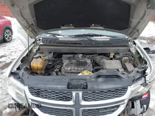 2012 Dodge Journey SXT with VIN 3C4PDCCG6CT135911, listed as a IAAI auction lot 41448632 with 179,440 mi miles and . Bid and sale history available at DreamBid. Image 10.