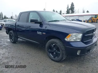 2015 Ram 1500 Outdoorsman z VIN 1C6RR7LTXFS594418, wystawiony jako IAAI lot #41456449 z przebiegiem 92 828 mil mil oraz . Historia ofert i sprzedaży dostępna na DreamBid. Obrazek 1.