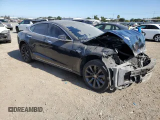 2014 Tesla Model S 60 with VIN 5YJSA1H13EFP38425, listed as a Copart auction lot 63686205 with 183,968 mi miles and Salvage title. Bid and sale history available at DreamBid. Image 4.