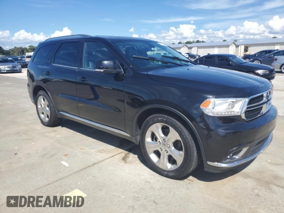 2014 Dodge Durango Limited with VIN 1C4SDHDT0EC277916, listed as a Copart auction lot 73820614 with 78,401 mi miles and Salvage title. Bid and sale history available at DreamBid. Image 4.