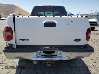 1999 Ford F-150 XL with VIN 1FTRX08LXXKA81637, listed as a Copart auction lot 64637375 with Not provided miles and Salvage title. Bid and sale history available at DreamBid. Image 6.