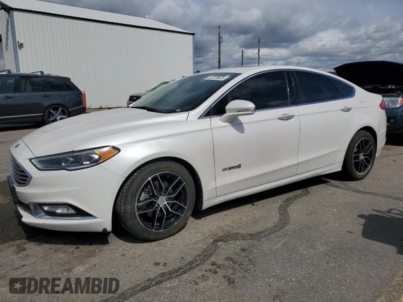 2017 Ford Fusion Hybrid SE with VIN 3FA6P0LU8HR142229, listed as a Copart auction lot 57079925 with 118,629 mi miles and Salvage title. Bid and sale history available at DreamBid. Image 1.