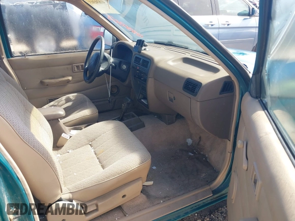 1997 Nissan Frontier XE z VIN 1N6SD16S8VC414870, wystawiony jako IAAI lot #41830303 z przebiegiem 103 158 mil mil oraz . Historia ofert i sprzedaży dostępna na DreamBid. Obrazek 5.