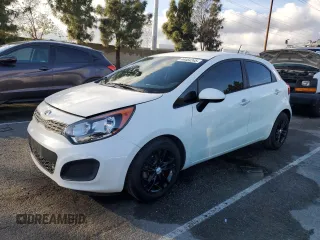 2015 Kia Rio LX with VIN KNADM5A39F6460207, listed as a Copart auction lot 44464245 with 106,792 mi miles and Salvage Title. Bid and sale history available at carsss.com. Image 1.