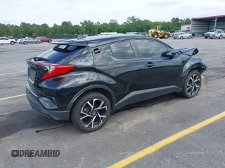 2019 Toyota C-HR XLE with VIN NMTKHMBX4KR096569, listed as a IAAI auction lot 42147017 with 111,569 mi miles and . Bid and sale history available at DreamBid. Image 4.