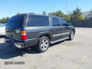 2003 Chevrolet Suburban LT z VIN 3GNFK16T43G175581, wystawiony jako IAAI lot #41584032 z przebiegiem Nie podano mil oraz . Historia ofert i sprzedaży dostępna na DreamBid. Obrazek 4.