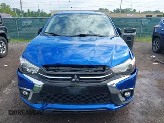 2018 Mitsubishi Outlander SE with VIN JA4AR3AW6JU000961, listed as a IAAI auction lot 42720633 with 124,554 mi miles and . Bid and sale history available at DreamBid. Image 13.