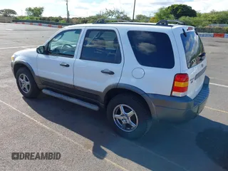 2006 Ford Escape XLT with VIN 1FMCU03116KA05836, listed as a IAAI auction lot 42310284 with 128,620 mi miles and . Bid and sale history available at DreamBid. Image 3.