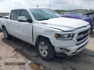 2023 Ram 1500 Big Horn with VIN 1C6SRFFT4PN532343, listed as a IAAI auction lot 42111051 with 15,079 mi miles and . Bid and sale history available at DreamBid. Image 1.