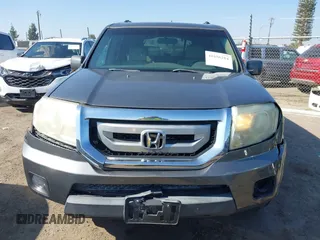 2009 Honda Pilot EX with VIN 5FNYF48439B036957, listed as a IAAI auction lot 41656284 with 199,115 mi miles. Bid and sale history available at carsss.com. Image 12.