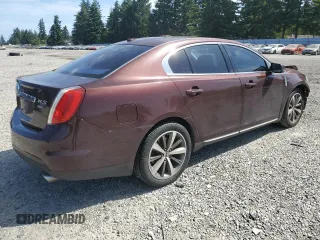 2009 Lincoln MKS z VIN 1LNHM94R89G601127, wystawiony jako Copart lot #60551075 z przebiegiem 102 000 mil mil oraz Szkoda całkowita • Salvage title. Historia ofert i sprzedaży dostępna na DreamBid. Obrazek 3.