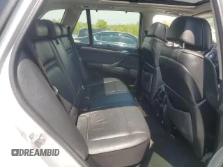 2013 BMW X5 xDrive35i z VIN 5UXZV4C53D0E03842, wystawiony jako Copart lot #52926155 z przebiegiem 178 275 mil mil oraz Szkoda całkowita • Salvage title. Historia ofert i sprzedaży dostępna na DreamBid. Obrazek 11.
