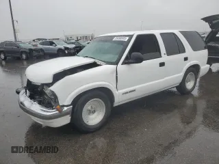 1999 Chevrolet Blazer z VIN 1GNCS13WXXK121279, wystawiony jako Copart lot #55698505 z przebiegiem 123 459 mil mil oraz Szkoda całkowita • Salvage title. Historia ofert i sprzedaży dostępna na DreamBid. Obrazek 1.