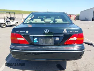 2001 Lexus LS 430 z VIN JTHBN30F810045610, wystawiony jako IAAI lot #42004279 z przebiegiem 143 497 mil mil oraz . Historia ofert i sprzedaży dostępna na DreamBid. Obrazek 15.