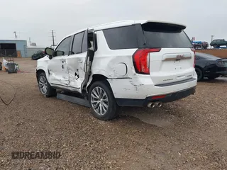 2021 GMC Yukon Denali with VIN 1GKS2DKL0MR178210, listed as a IAAI auction lot 41934532 with 91,785 mi miles. Bid and sale history available at carsss.com. Image 3.