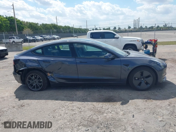 2023 Tesla Model 3 with VIN 5YJ3E1EA3PF623114, listed as a IAAI auction lot 41710385 with 31,663 mi miles and . Bid and sale history available at carsss.com. Image 13.