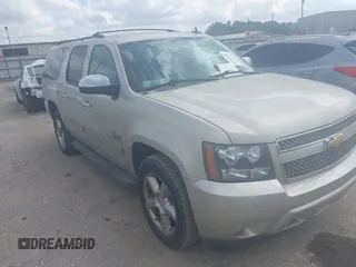 2013 Chevrolet Suburban LS with VIN 1GNSCHE01DR152210, listed as a IAAI auction lot 41528484 with 206,666 mi miles. Bid and sale history available at carsss.com. Image 1.