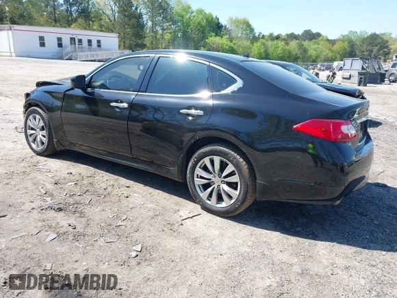 2012 Infiniti M with VIN JN1BY1AR1CM392880, listed as a IAAI auction lot 42012317 with 106,000 mi miles and . Bid and sale history available at DreamBid. Image 3.