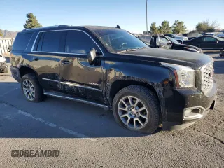2018 GMC Yukon Denali with VIN 1GKS1CKJ0JR106589, listed as a Copart auction lot 79977034 with 98,022 mi miles and Salvage Title. Bid and sale history available at carsss.com. Image 4.