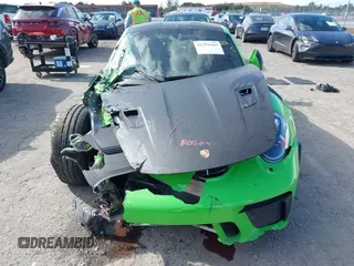 2019 Porsche 911 GT3 RS with VIN WP0AF2A94KS164340, listed as a IAAI auction lot 41319442 with 10,881 mi miles and . Bid and sale history available at DreamBid. Image 12.