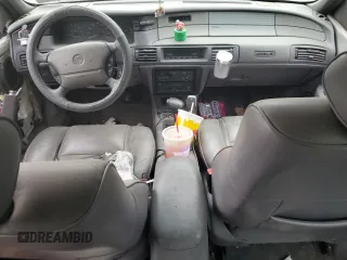 1995 Mercury Sable z VIN 1MELM5345SG617402, wystawiony jako Copart lot #46243165 z przebiegiem 133 262 mil mil oraz Szkody całkowita. Historia ofert i sprzedaży dostępna na DreamBid. Obrazek 8.