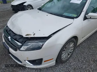 2010 Ford Fusion Hybrid with VIN 3FADP0L30AR200029, listed as a IAAI auction lot 42394846 with 192,634 mi miles and . Bid and sale history available at DreamBid. Image 17.