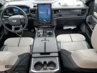 2023 Ford F-150 Lightning Pro with VIN 1FT6W1EV9PWG25278, listed as a Copart auction lot 60293095 with 24,450 mi miles and Salvage title. Bid and sale history available at DreamBid. Image 8.